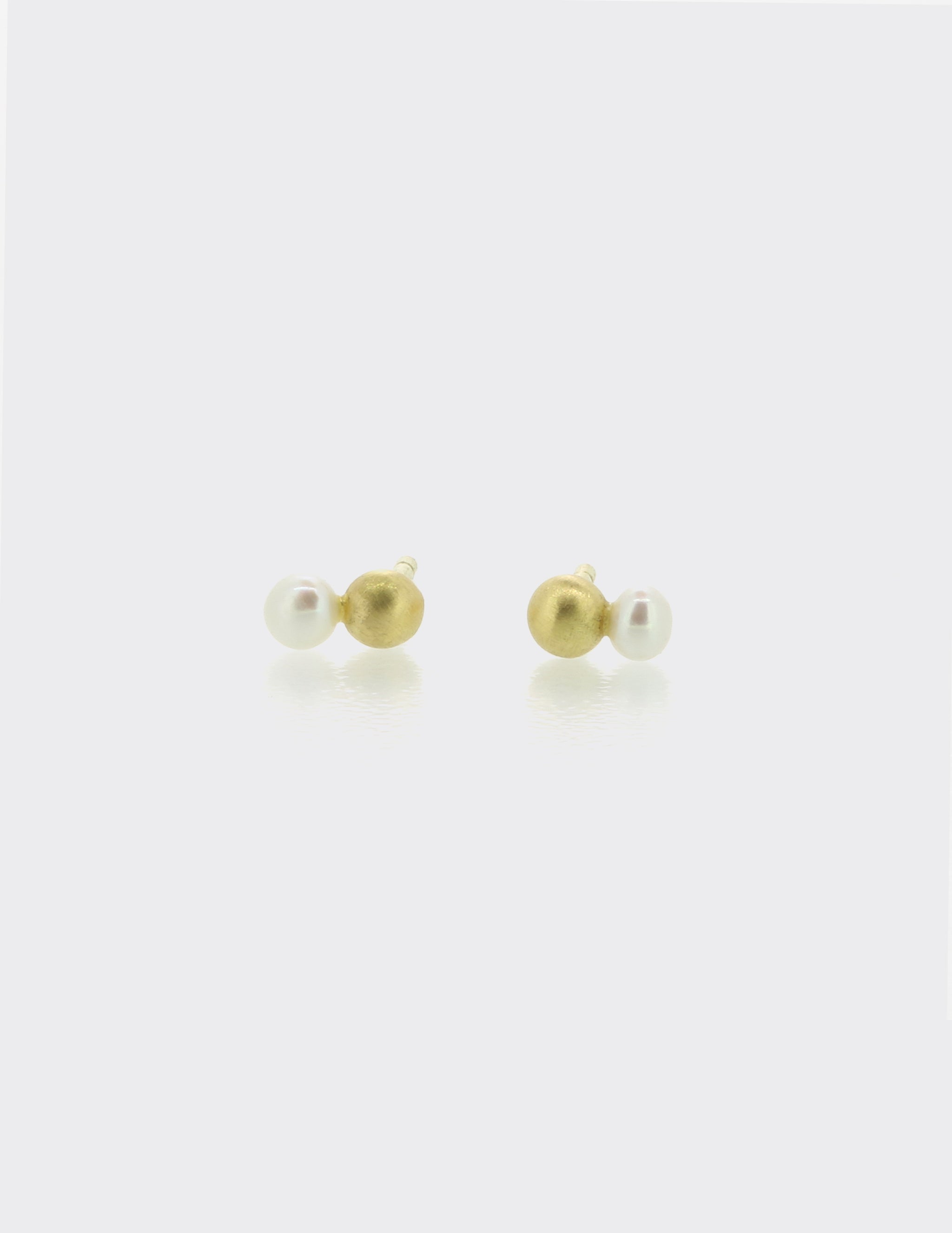 Gold and pearl ear studs