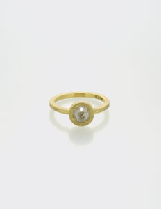 Rim ring with milky diamond