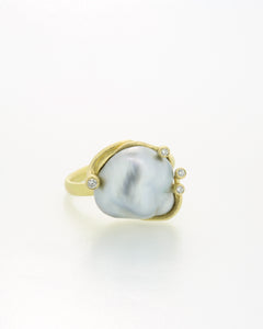 Tahitian keshi pearl and diamond ring.